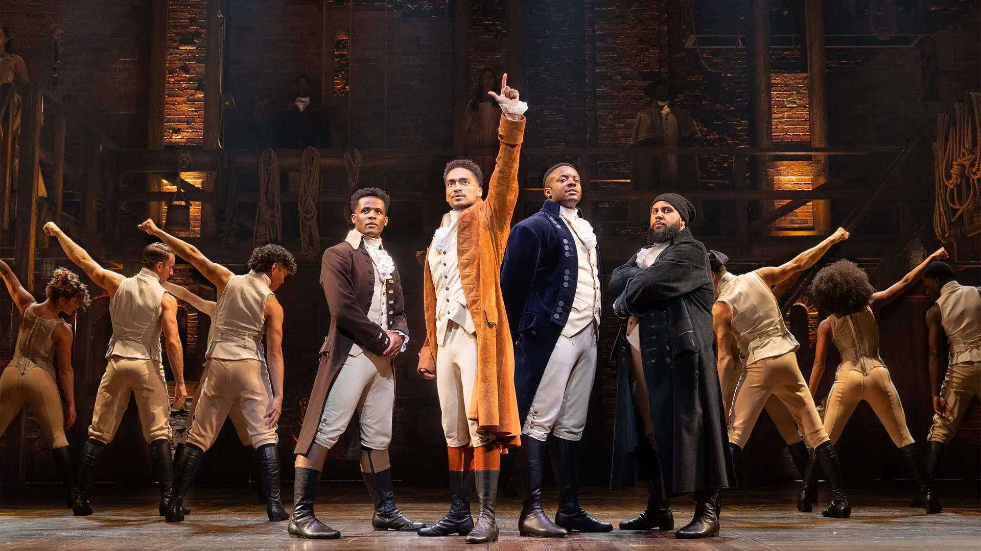 Alex Sawyer as Alexander Hamilton, Yeukayi Ushe as Marquis De Lafayette, Jordan Castle as Hercules Mulligan and company. Photo by Danny Kaan
